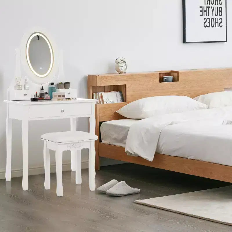 Vanity with LED-lit makeup mirror, featuring a padded stool, 3 lighting modes, and 3 storage drawersperfect for the bedroom.